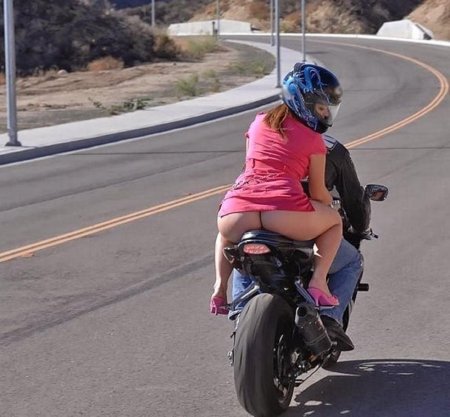 Girls without panties on a motorcycle