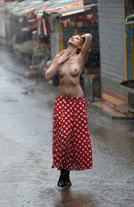 Naked in the street rain
