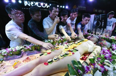 Sushi on the body of girl