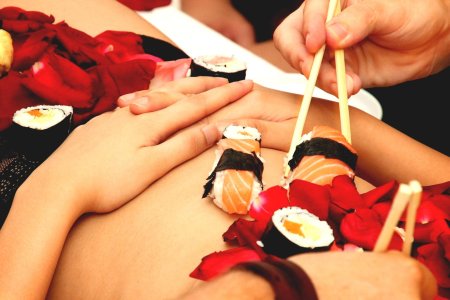 Sushi on a naked girl