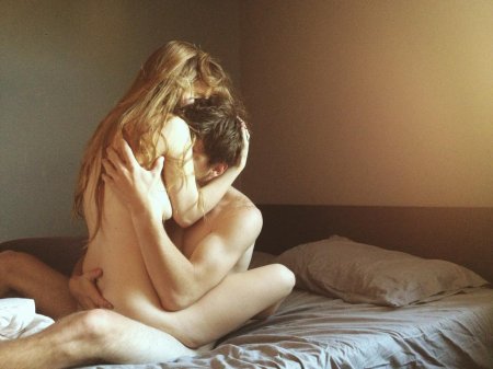 Naked hug in bed