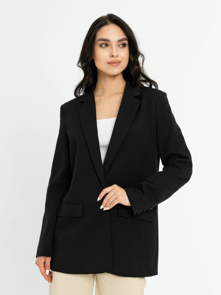 The jacket is an elongated oversize black