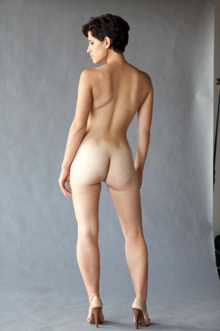 Naked women with figure sand clock