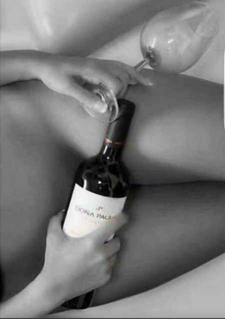 Pornographic photo shoot with wine