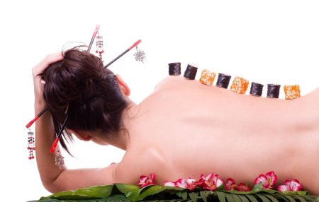 Sushi on the body of a girl