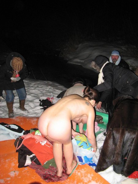 Naked women in the hole for baptism