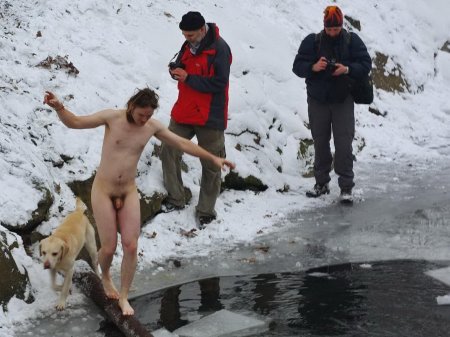 Naked women bathe in the hole