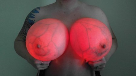 Luminous silicone breasts