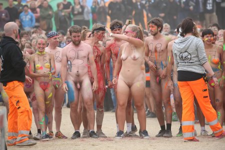 A parade of naked people on the street