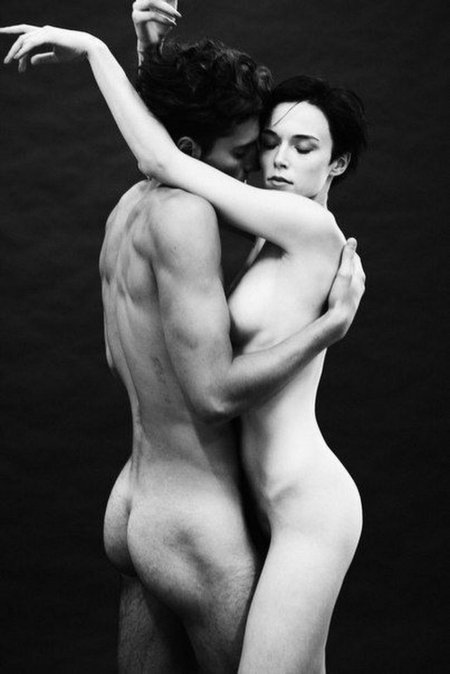 Woman photographer and naked men