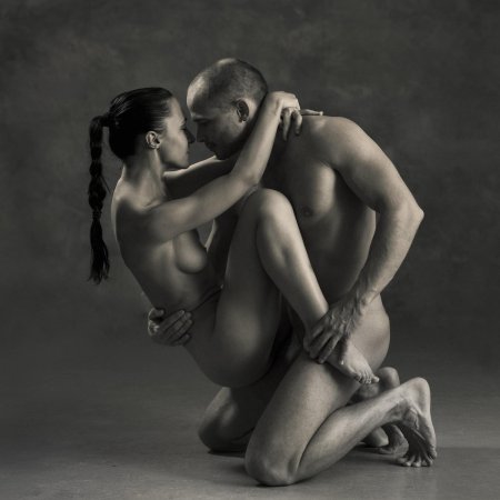 Poses for an erotic photo shoot