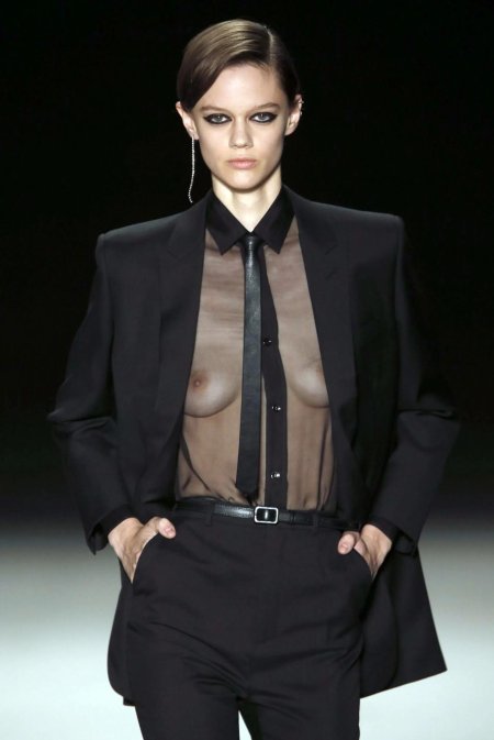 Transparent blouse on a naked body