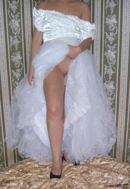 Bride in wedding dresses nude