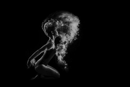 The body of a girl on dark background