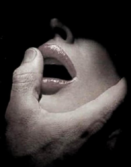 Male finger on the lips