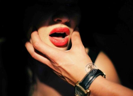 Finger in the mouth of a girl
