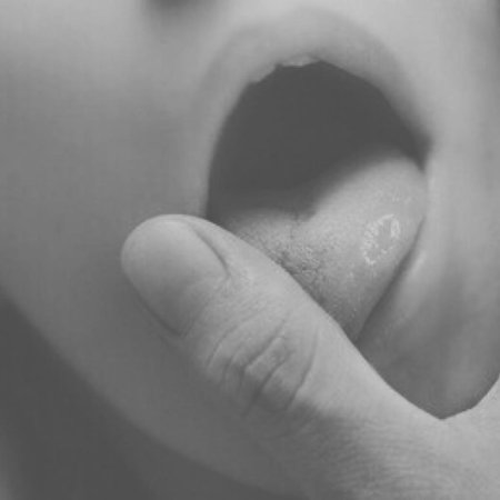 Licks her finger