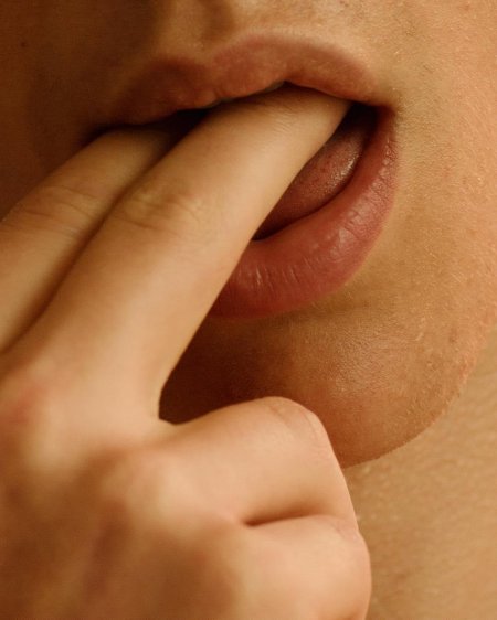 Licks her finger