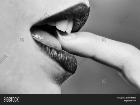 Girl bites her finger