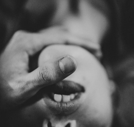 Finger in mouth