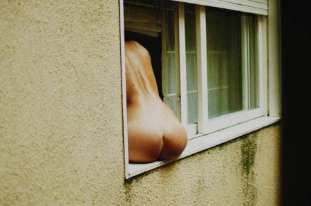 Girl in the window naked