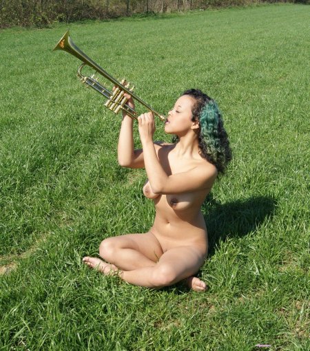 Naked women playing on a pipe with tits