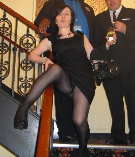Adult women in tights under a skirt